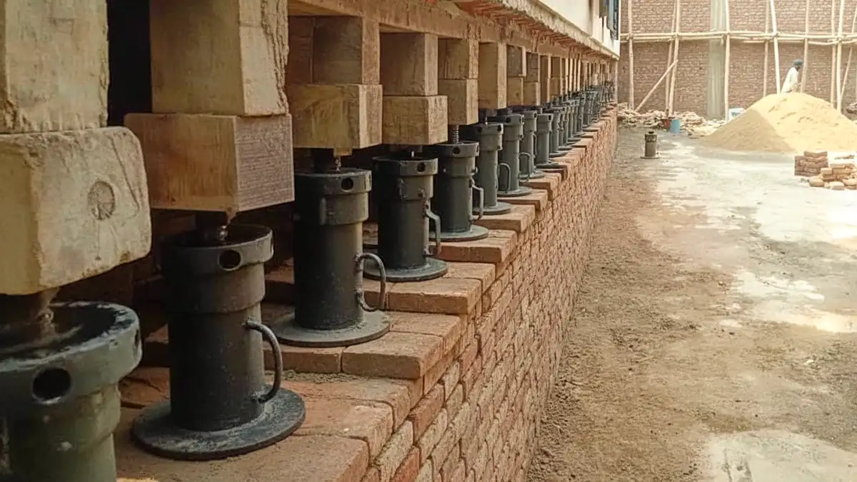 Professional house lifting service using heavy-duty jacks to safely raise homes without demolition. Trusted experts with 30+ years of experience.